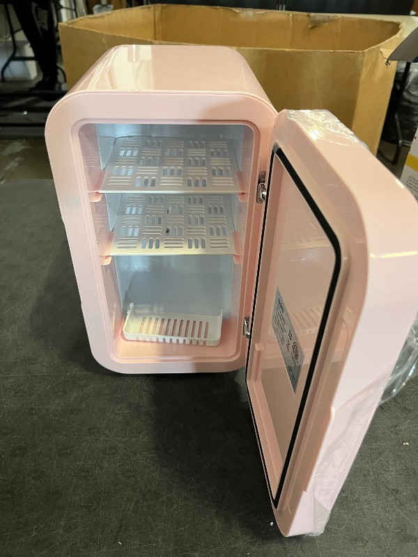 Photo 1 of Missing Charger**
YASHE Mini Fridge, 6 Liter/8 Can 110V AC/DC Portable Thermoelectric Cooler Refrigerators for Bedroom, Skincare, Beverage, Office, Dorm Room and Car, Pink
