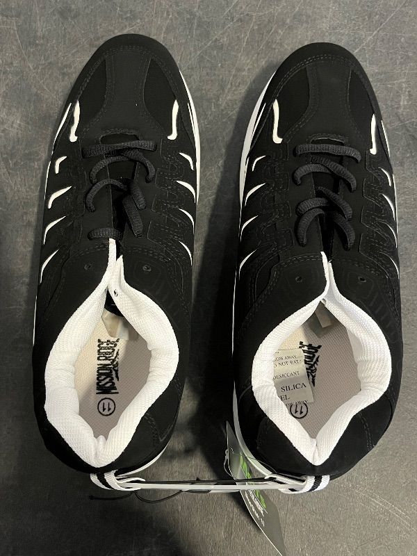 Photo 1 of Size 11 Mens Black and White Sneakers
