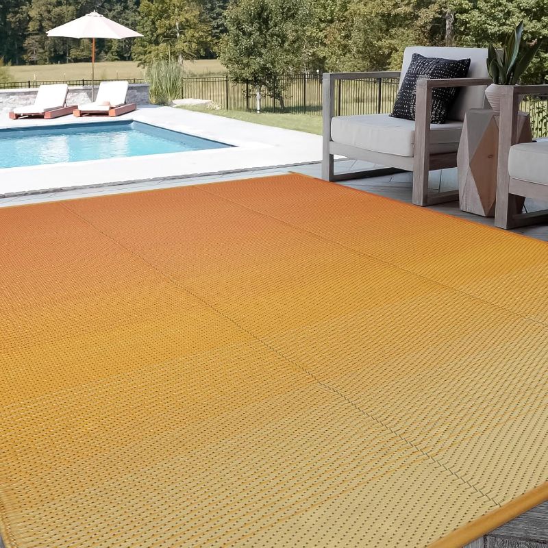 Photo 1 of Lahome Outdoor Rug 9x12 Patio Waterproof, Reversible Plastic Straw Camping Rv Rugs for Outside Under Awning, Portable Lightweight Carpet for Porch Backyard, Orange Yellow 9'x12'
