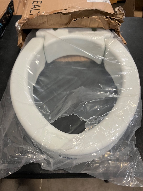 Photo 1 of Carex Elongated Hinged Toilet Seat Riser, Adds 3.5 Inches of Height to Toilet, 300 Pound Weight Capacity, Raised Toilet Seat
