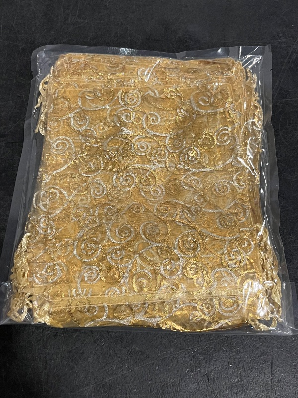 Photo 1 of Staruby Organza Gift Bags 100Pcs Gold Sheer Organza Bag 4x6 Inch Mesh Favor Bags Drawstring Jewelry Rattan Printed Gift Pouches for Wedding Party Favors Couple Shower Christmas Gifts Candy Bags
