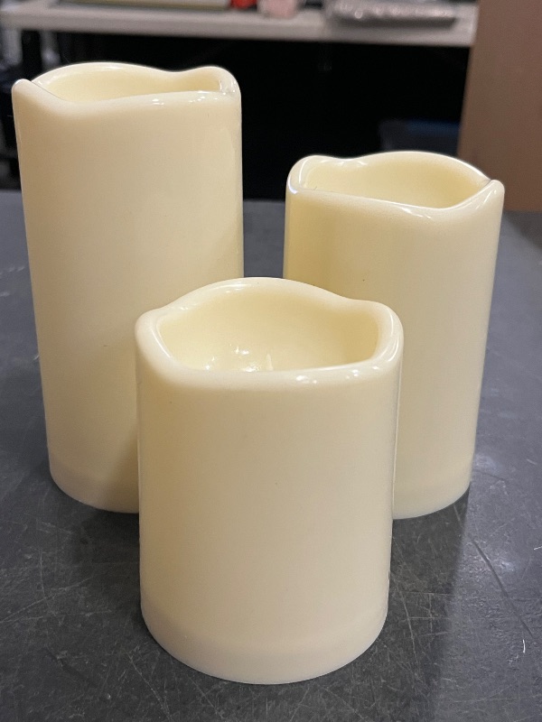 Photo 1 of Flameless Candles 4" 5" 6" Set of 3 Ivory Outdoor Indoor Pillars 3" Diameter Battery Operated Flickering Candles Include 10-Key Remote Timer Function 400+ Hours Requires 2 AA Batteries