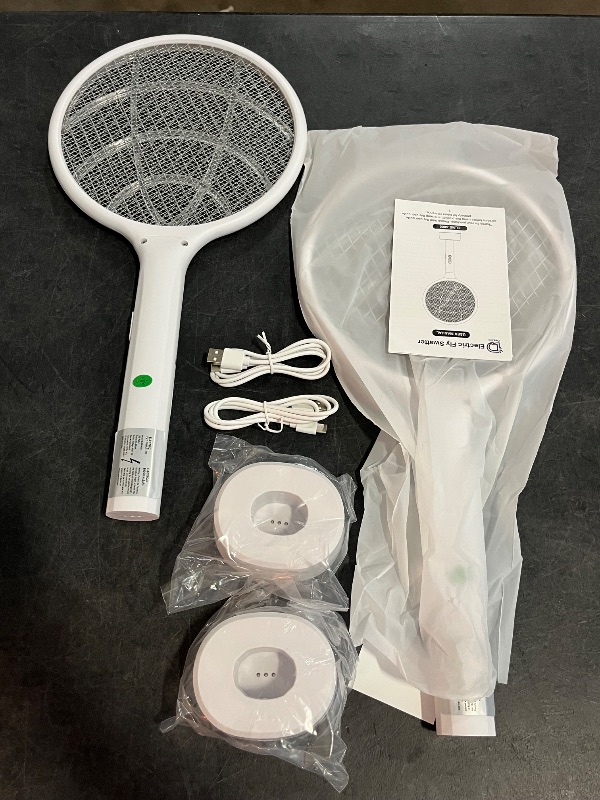 Photo 1 of Electric Fly Swatter 4000V Bug Zapper Racket Dual Modes Mosquito Killer with Purple Mosquito Light Rechargeable for Indoor Home Office Backyard Patio Camping
