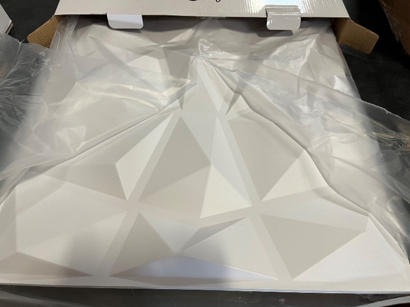 Photo 1 of Art3d 12 Pack 3D Diamond Design Wall panels 19.7"x19.7" PVC Panel for Interior Wall Decor Living Room, Office, TV Background, Snow White
