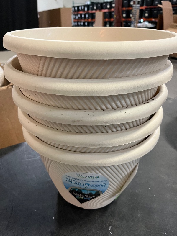 Photo 1 of 11 in. Eleanora Cream Plastic Self-Watering Planter (11 in. D X 7.9 in. H) - 4 Pack