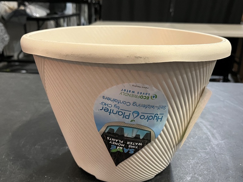 Photo 1 of 11 in. Eleanora Cream Plastic Self-Watering Planter (11 in. D X 7.9 in. H) - 4 Pack