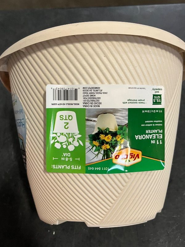 Photo 1 of 11 in. Eleanora Cream Plastic Self-Watering Planter (11 in. D X 7.9 in. H)