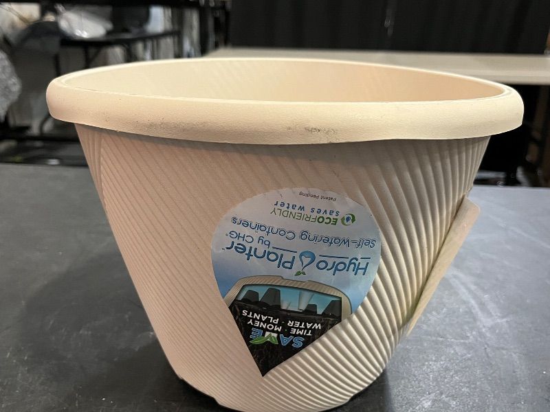 Photo 1 of 11 in. Eleanora Cream Plastic Self-Watering Planter (11 in. D X 7.9 in. H)