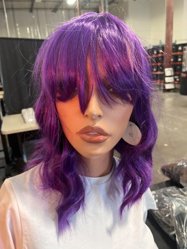 Photo 1 of Purple Short Bob Wigs with Bang Synthetic Loose Curly Wavy Bob Wig Shoulder Length for Women Girls Daily Short Wavy Colorful Wig Everyday Hairstyle
