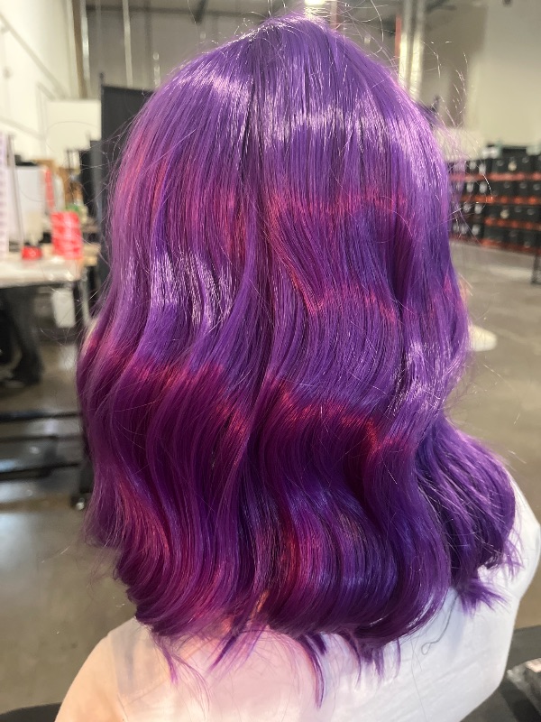Photo 1 of Purple Short Bob Wigs with Bang Synthetic Loose Curly Wavy Bob Wig Shoulder Length for Women Girls Daily Short Wavy Colorful Wig Everyday Hairstyle
