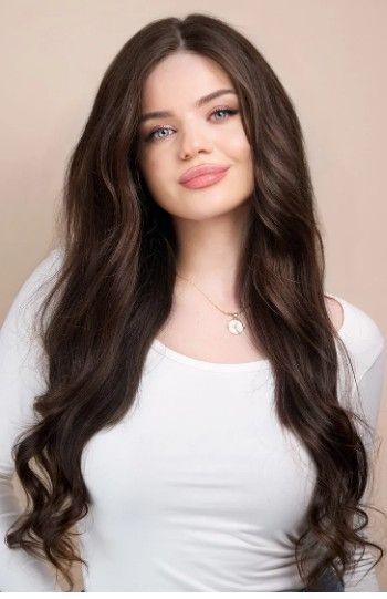 Photo 1 of Brown Wigs for Women Long Curled Wig Layered Brown Hair Wig 24Inch Side Part Part Dark Brown Wig Natural Heat Resistant Synthetic Fiber Wig for Party Halloween