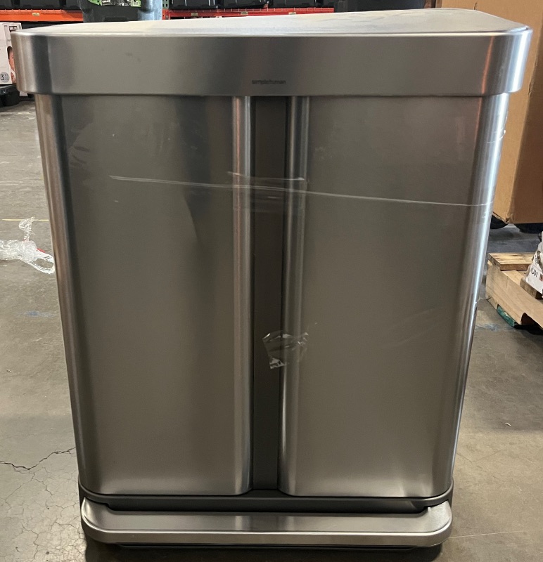 Photo 1 of *Tape Residue From Shipping/Lid Minor Damage**
Simplehuman 58 Liter / 15.3 Gallon Rectangular Hands-Free Dual Compartment Recycling Kitchen Step Trash Can with Soft-Close Lid, Brushed Stainless Steel