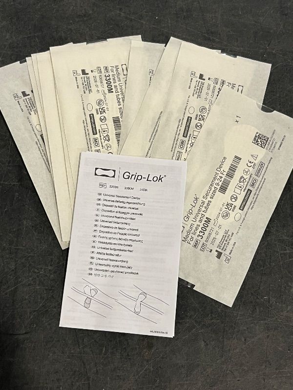 Photo 1 of Size 9-24 Grip-Lol Medium Universal Securement Device for Lines and Tubes, 10 Pack
