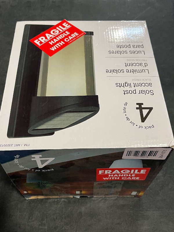 Photo 1 of Missing 2** 
Solar Outdoor Wall Light with Motion Sensor, Black, 4-Pack