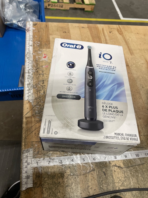Photo 1 of **FACTORY SEALED** Oral-B iO Deep Clean + Protect Rechargeable Electric Toothbrush, Black, iO Series 7, 2 Replacement Brush Heads, Charging Travel Case