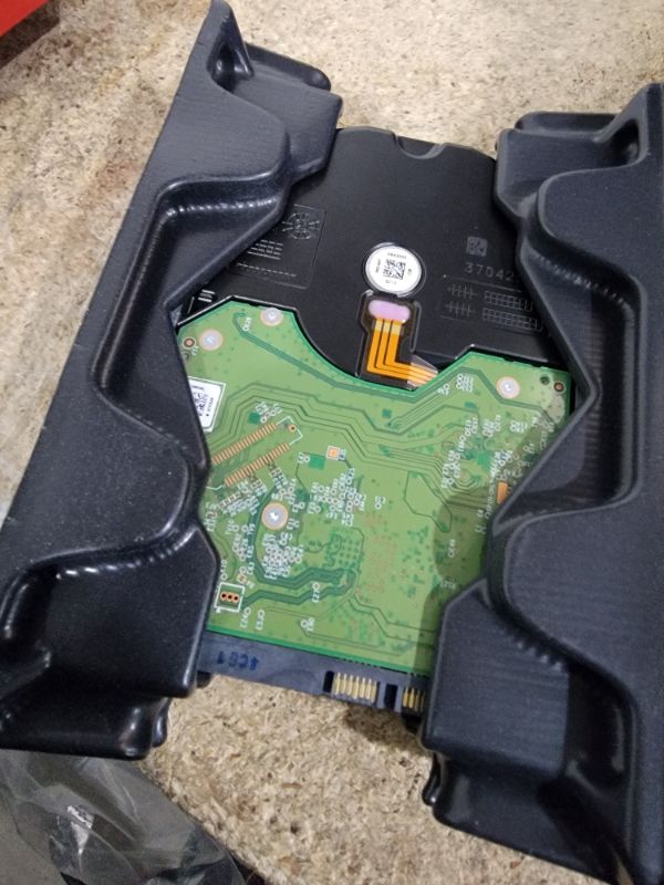 Photo 1 of **FOR PARTS ONLY / NON-FUNCTIONAL*** Western Digital 10TB WD Red Plus NAS Internal Hard Drive HDD - 7200 RPM, SATA 6 GB/s, CMR, 512 MB Cache, 3.5" - WD100EFGX