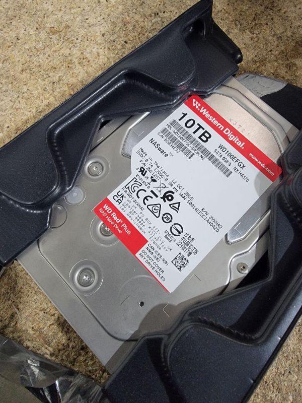 Photo 1 of **FOR PARTS ONLY / NON-FUNCTIONAL*** Western Digital 10TB WD Red Plus NAS Internal Hard Drive HDD - 7200 RPM, SATA 6 GB/s, CMR, 512 MB Cache, 3.5" - WD100EFGX