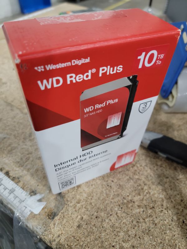 Photo 1 of **FOR PARTS ONLY / NON-FUNCTIONAL*** Western Digital 10TB WD Red Plus NAS Internal Hard Drive HDD - 7200 RPM, SATA 6 GB/s, CMR, 512 MB Cache, 3.5" - WD100EFGX