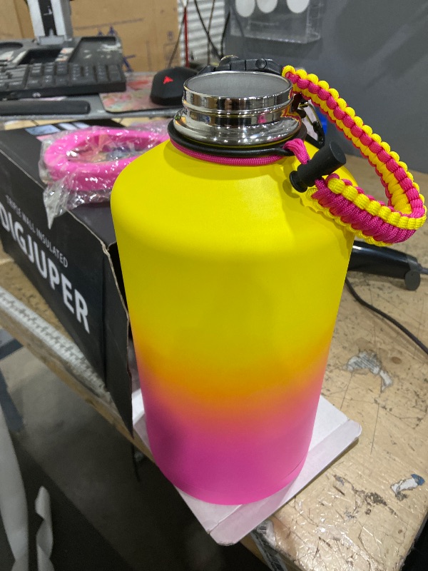 Photo 1 of 1 Gallon Insulated Water Bottle - with Straw & Auto Chug Lid, Paracord Handle, Bottle Sleeve, 128 oz Stainless Steel Water Bottle, Large Metal Gallon Water Jug Canteen for Sport Work