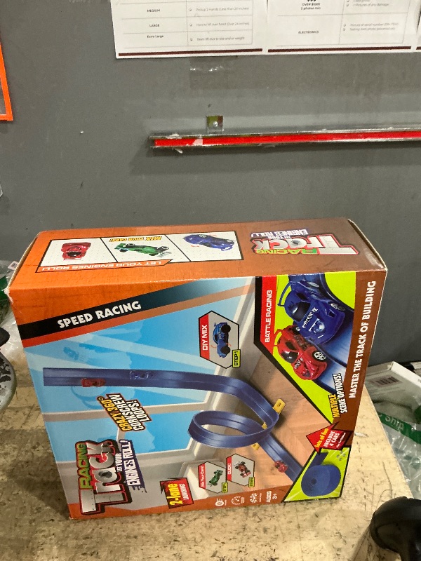 Photo 1 of 20 Ft Flexible Race Track Toys, Flex Race Car Ramp Track with 4 Race Cars & Suction Cups Rolls Up Portable DIY Race Track Anti Gravity Car Track Set,Kids Racecar Track Toy(Blue)