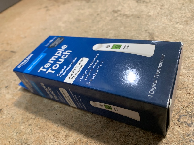 Photo 1 of **FOR PARTS** Amazon Basic Care Temple Touch Digital Thermometer, White