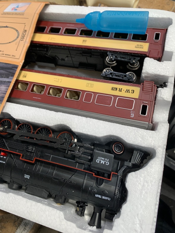 Photo 1 of *****************missing battery and the charger***************
Hot Bee Train Set for Boys, Alloy Remote Control Train Sets with Steam Locomotive, Light Up Cars and Tracks, Electric Trains Set Toys for Toddler Kids, Christmas Toys Gifts for 3 4 5 6 7 8+ Y