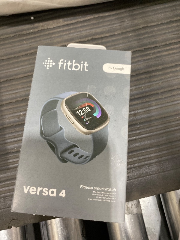 Photo 1 of **FOR PARTS ONLY WON'T CONNECT*** Fitbit Versa 4 Fitness Smartwatch with Daily Readiness, GPS, 24/7 Heart Rate, 40+ Exercise Modes, Sleep Tracking and more, Waterfall Blue/Platinum, One Size (S & L Bands Included)