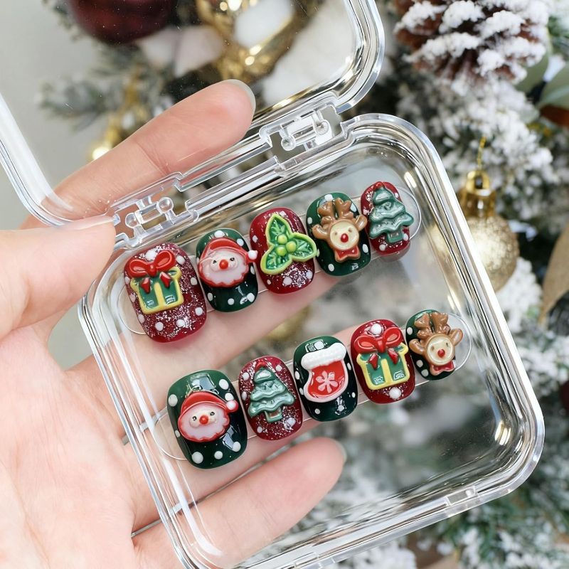 Photo 1 of 10 Pcs Christmas Handmade Acrylic Press on Nails Short Square Fake Nails with Design Adorable 3D Snowman Reindeer Charm Glue on Nails Artificial Handmade Nail Supplies for Women - Size M