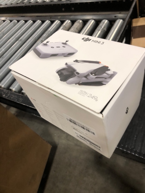Photo 1 of DJI Mini 3 - Lightweight and Foldable Mini Camera Drone with 4K HDR Video, 38-min Flight Time, True Vertical Shooting, and Intelligent Features