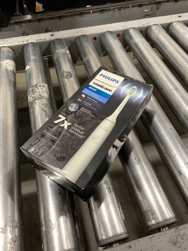 Photo 1 of Philips Sonicare 4100 Rechargeable Electric Toothbrush, with Pressure Sensor, 2 Intensity Settings, SmarTimer and QuadPacer, 14-Day Battery Life, White, Model HX3681/23