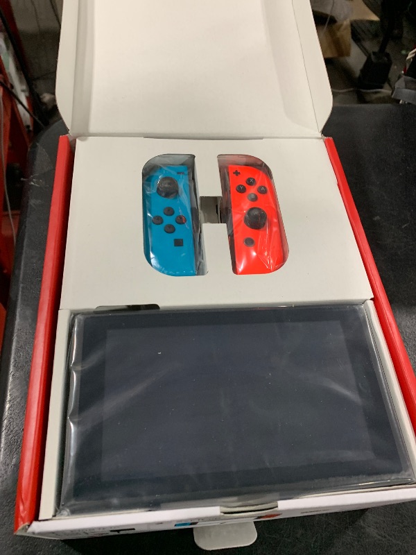 Photo 1 of Nintendo Switch™ with Neon Blue and Neon Red Joy?Con™