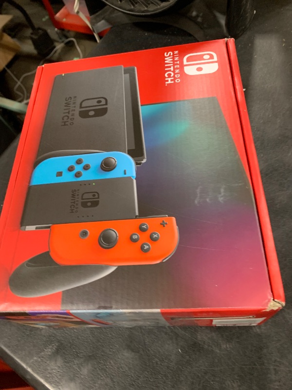 Photo 1 of Nintendo Switch™ with Neon Blue and Neon Red Joy?Con™