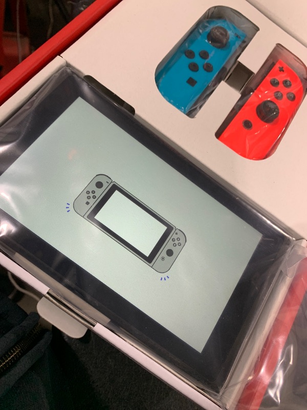 Photo 1 of Nintendo Switch™ with Neon Blue and Neon Red Joy?Con™