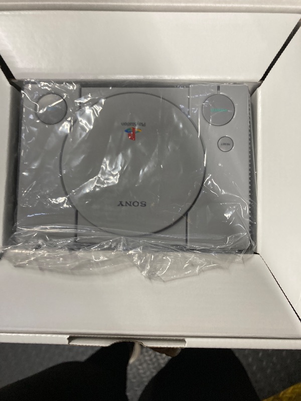 Photo 1 of Original Sony PlayStation Classic Mini Console With 20 Classic Games (Renewed)