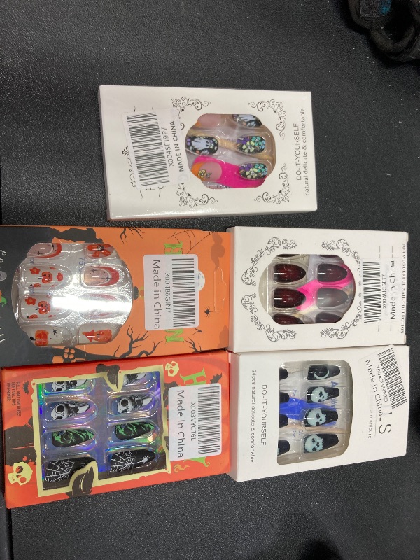 Photo 1 of ***5 PACKS INCLUDED***Halloween Press on Nails Medium Square MABKJLF Fake Nails Black False Nails with Designs Skull Moon Full Cover Glossy Glue on Nail Acrylic Nails for Women Girls 24Pcs***5 PACKS INCLUDED***