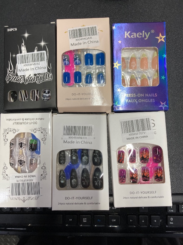 Photo 1 of ***6 PACKS INCLUDED***24Pcs Halloween Press on Nails Short Square Cute Fake Nails with Spider Web Mummy Designs Green Orange Halloween Nails Decoration French Tip Glue on Nails Cobweb Stick on Nails for Women Manicure***6 PACKS INCLUDED***