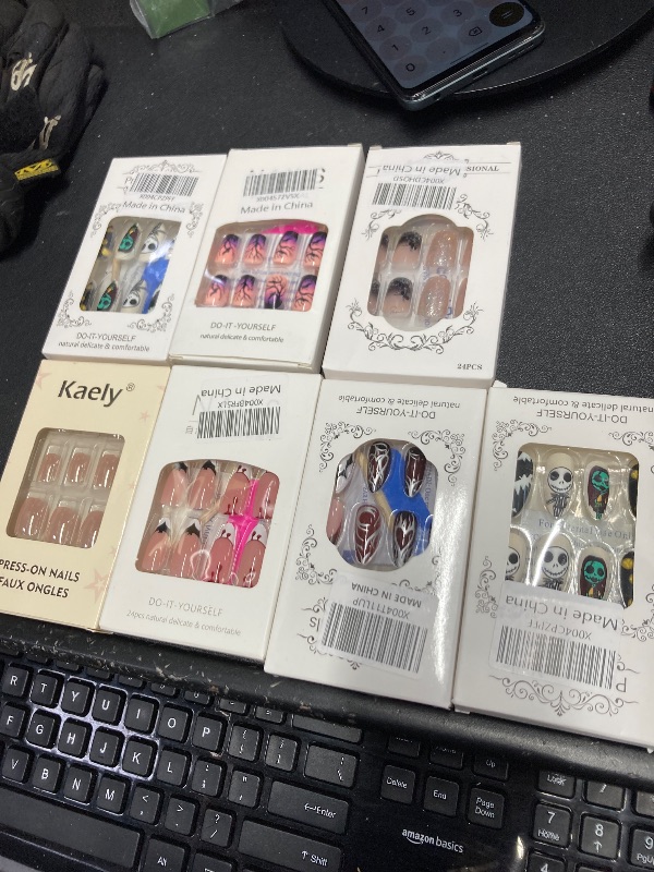 Photo 1 of ***7 PACKS INCLUDED***Halloween Press on Nails Medium Square MABKJLF Black Gradient Fake Nails Glitter False Nails with Spider Designs Glossy Glue on Nails Artificial Nails for Women Girls 24 Pcs***7 PACKS INCLUDED***