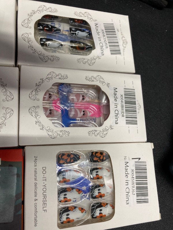 Photo 1 of ***6 ITEMS INCLUDED***Halloween Press on Nails Medium Almond MABKJLF Fake Nails Black False Nails with Designs Ghost Flower Matte Glue on Nail Acrylic Nails for Women Girls 24Pcs***6 ITEMS INCLUDED***