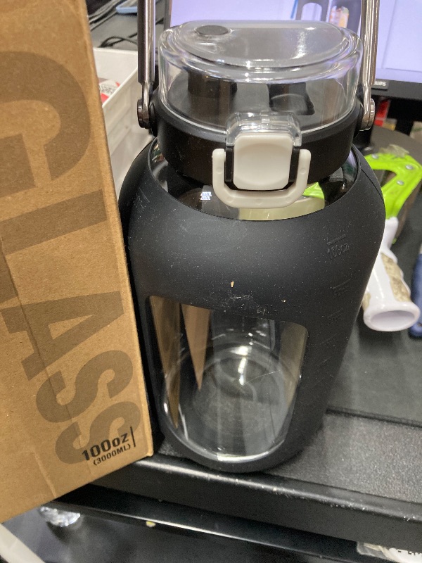 Photo 1 of  ** DIRTY** 
WINSA Large Glass Water Bottles with Stainless Steel Handle,100 oz Gallon Drinking Bottle ,Black