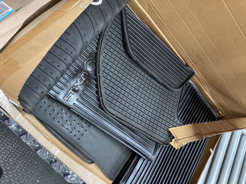 Photo 1 of ** DIRTY**
**VERY USE**
Amazon Basics 4-Piece Heavy Duty PVC Floor Mats with Cargo Liner and Rear, Waterproof Trim To Fit Car Mats, Black
