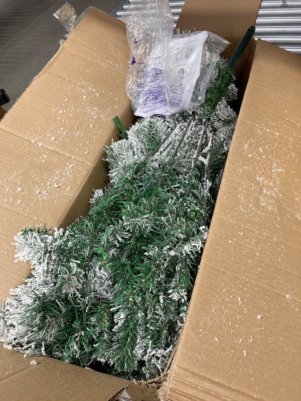 Photo 1 of ***(DAMAGE SELLING AS IS PARTS ONLY)*** ) DAYBETTER 6ft Artificial Christmas Tree, Snow Flocked Christmas Pine Tree, with 210 Warm White Lights, 627 White Tips Branch, Includes Metal Stand for Xmas Holiday, Indoor and Outdoor Decor