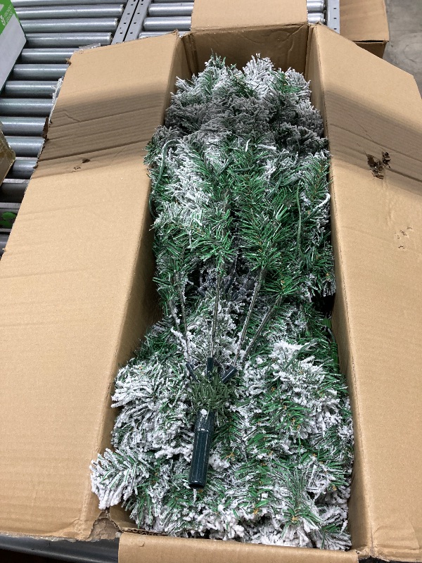 Photo 1 of ***(DAMAGE SELLING AS IS PARTS ONLY)*** ) DAYBETTER 6ft Artificial Christmas Tree, Snow Flocked Christmas Pine Tree, with 210 Warm White Lights, 627 White Tips Branch, Includes Metal Stand for Xmas Holiday, Indoor and Outdoor Decor