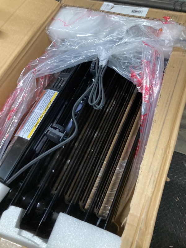 Photo 2 of Amazon Basics Portable Oil Radiator Heater for Indoor Use, 3 Heat Settings, Over-Heat Protection, ETL-certified Safety, 7 Oil-Filled Steel Fins, 1500W, 11"D x 14.8"W x 25.2"H, Black