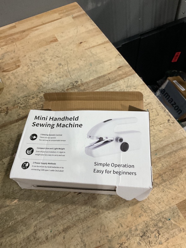 Photo 1 of *ACCESSORIES MISSING**Xamanabu Handheld Sewing Machine for Beginners, Portable Mini Sewing Machine with Two Speed Modes, Easy to Operate and Fast Stitch Suitable for Clothes, Fabrics and Quick Home Repairs