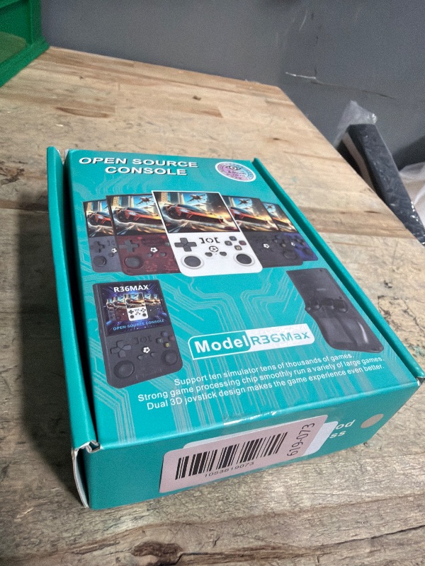 Photo 1 of **MISSING CHARGER**R36MAX Retro Handheld Games Console, Retro Game Console with 4.0 inch IPS HD Screen, Video Game Consoles with 64GB Memory, Portable Gaming Player for Travel, Gift for Teen or Partner, Gray