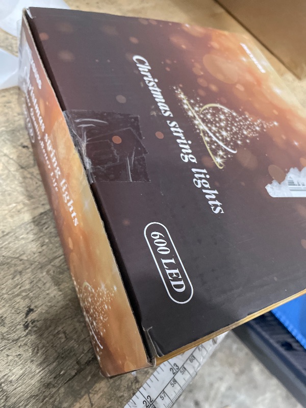 Photo 1 of JMEXSUSS 168FT 600 LED White Christmas Lights Outdoor with Remote String Lights Indoor Plug in Cool White Twinkle String Light for Tree Room Party Wedding Decorations