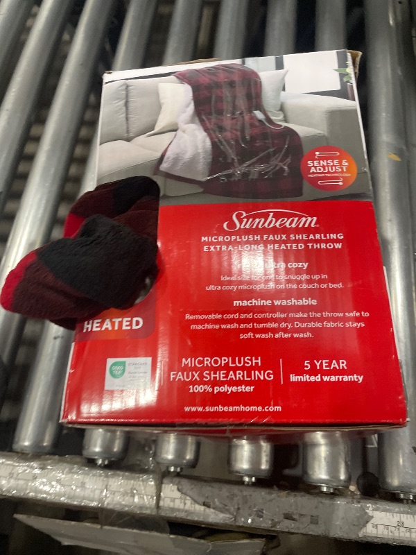 Photo 1 of ***PARTIAL SET - PRICE ADJUSTED***
Heated throw blanket