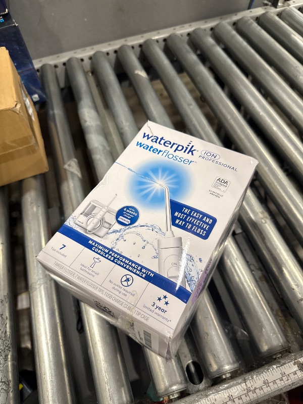 Photo 1 of ***PARTIAL SET - PRICE ADJUSTED***
Waterpik ION Professional Water Flosser, Rechargeable and Portable for Teeth, Gums, Braces, 10 Settings, 7 Flossing Tips For Multiple Users And Needs, ADA Accepted, WF-12 White, Packaging May Vary