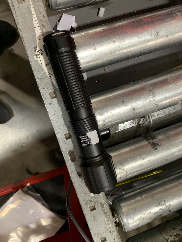 Photo 1 of **does not turn on**
handheld flashlight 