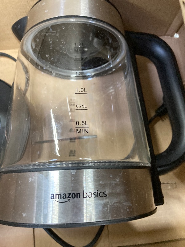 Photo 1 of **NEEDS CLEANING***Amazon Basics Electric Kettle with Glass Carafe for Tea and Coffee, BPA-Free, Fast Boiling, Auto Shut-Off, 1.7 Liter, 1500W, Black and Silver
